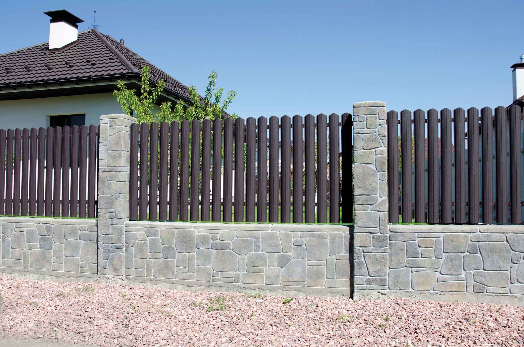 Geofenz metal fence surrounding a residential property